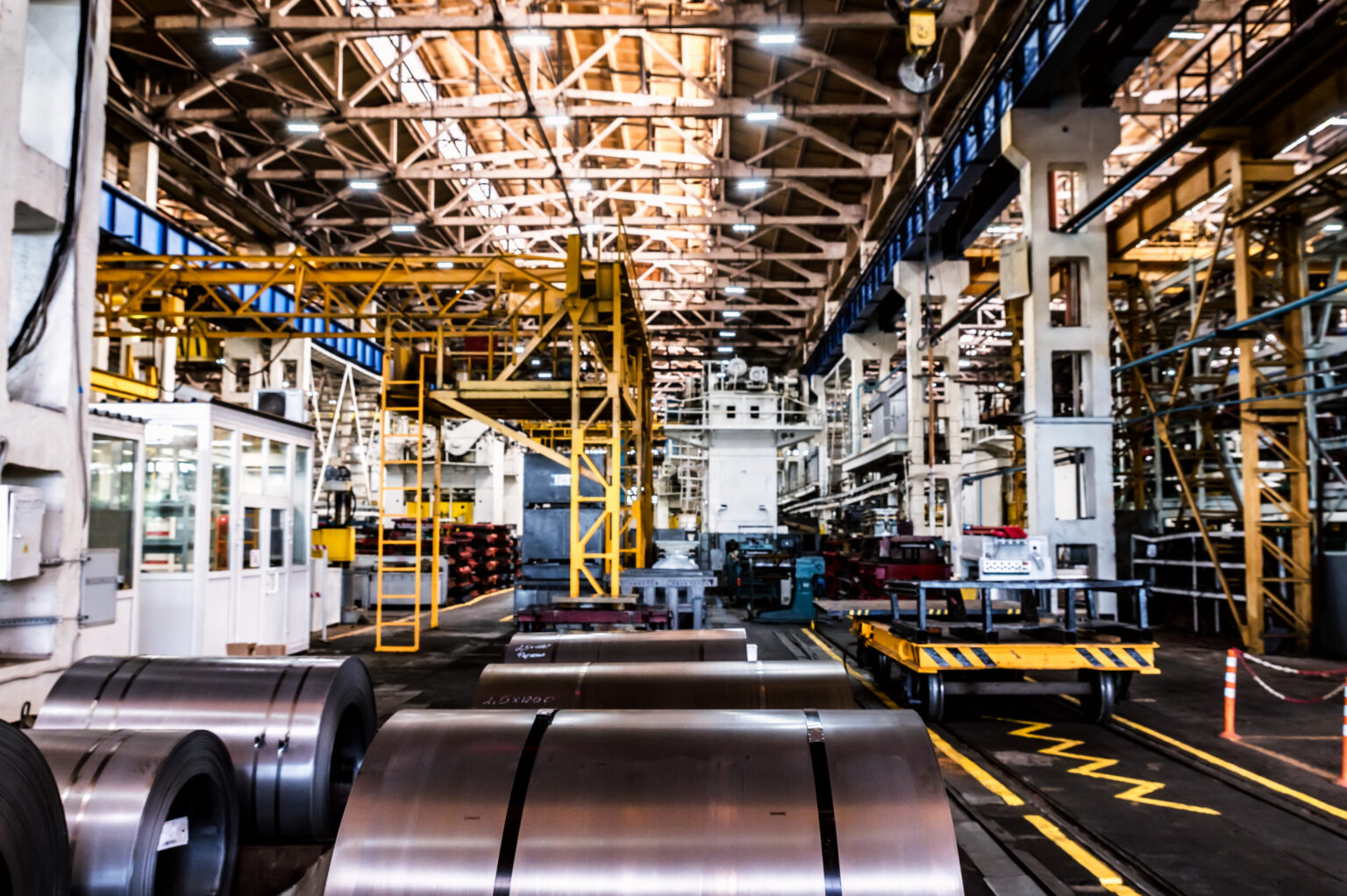Rolls of iron plate on the modern tractor factory